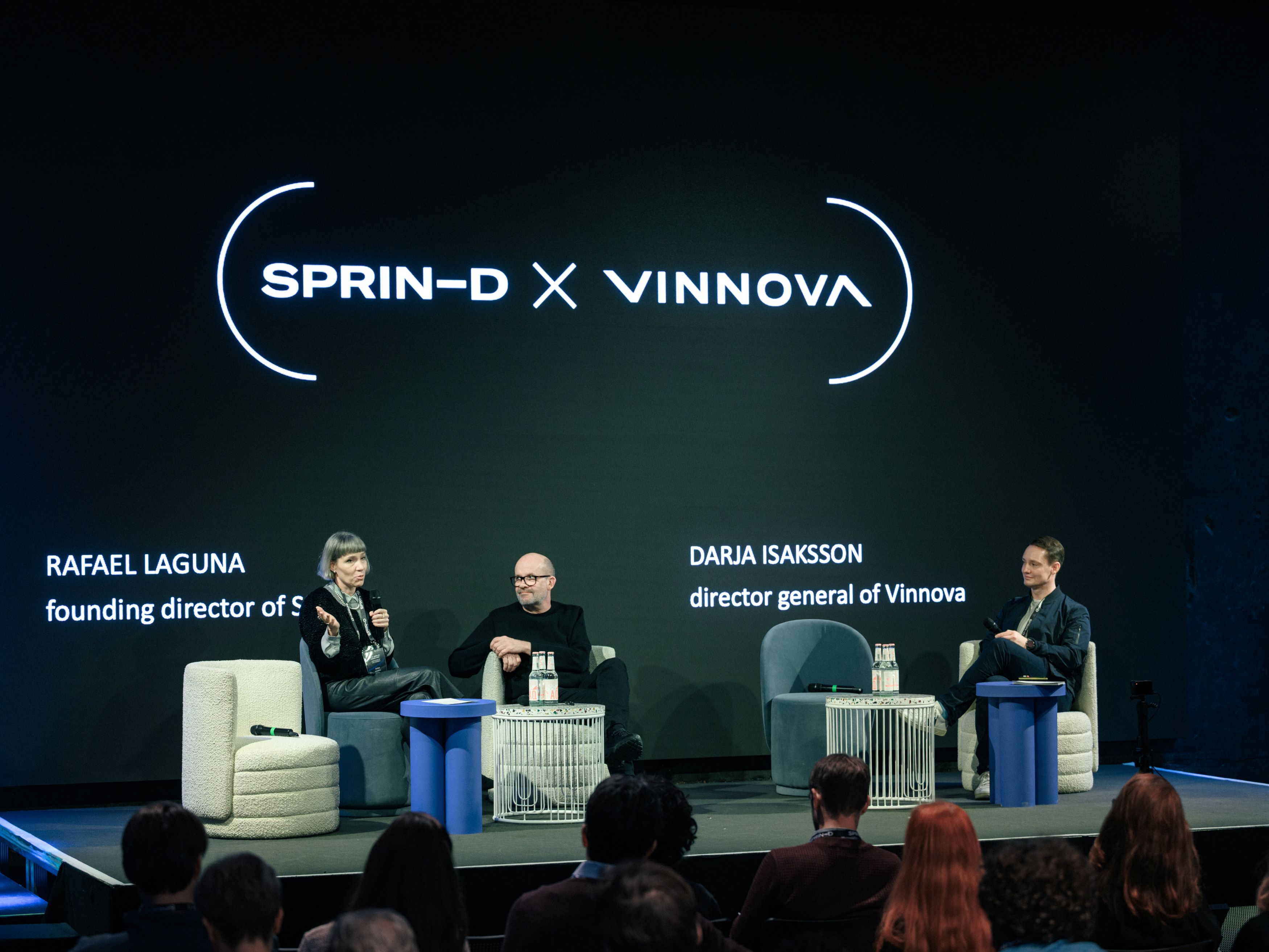 Darja Isaksson participates in a panel discussion on stage