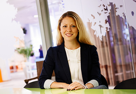 Cathrine Åsklint at a desk